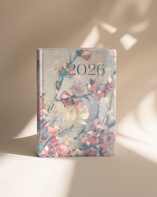 Floral design notebook with '2026' on a beige background